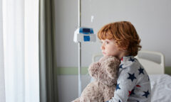 child on hospital bed